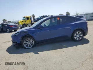 2023 Tesla Model Y Long Range with VIN 7SAYGAEE8PF927092, listed as a Copart auction lot 53917185 with 17,639 mi miles and Salvage Title. Bid and sale history available at DreamBid. Image 1.