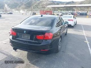 2015 BMW 3 Series 328i with VIN WBA3A5C55FP604316, listed as a IAAI auction lot 41915627 with 120,594 mi miles. Bid and sale history available at carsss.com. Image 4.