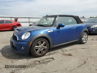 2015 MINI Convertible S z VIN WMWZP3C56F2A91297, wystawiony jako Copart lot #54479865 z przebiegiem 98 918 mil mil oraz Szkoda całkowita • Salvage title. Historia ofert i sprzedaży dostępna na DreamBid. Obrazek 1.