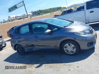 2020 Honda Fit LX with VIN 3HGGK5H40LM707356, listed as a IAAI auction lot 42076367 with 10,145 mi miles and . Bid and sale history available at DreamBid. Image 13.