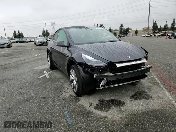 2024 Tesla Model Y with VIN 7SAYGDED5RF093410, listed as a Copart auction lot 50557225 with 6,396 mi miles and Salvage Title. Bid and sale history available at DreamBid. Image 11.