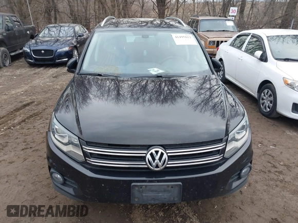 2016 Volkswagen Tiguan S with VIN WVGBV7AXXGW581315, listed as a IAAI auction lot 41495812 with 180,061 mi miles and . Bid and sale history available at DreamBid. Image 12.