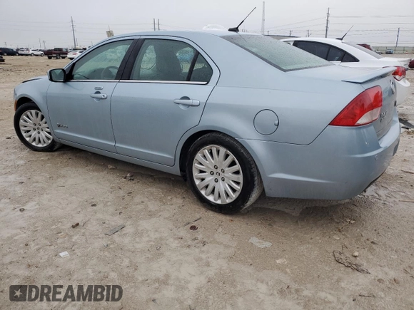 2010 Mercury Milan Hybrid with VIN 3MEDM0L31AR652976, listed as a Copart auction lot 82427944 with 115,014 mi miles and Salvage Title. Bid and sale history available at carsss.com. Image 2.