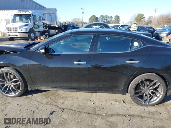 2016 Nissan Maxima SL z VIN 1N4AA6AP7GC395972, wystawiony jako IAAI lot #41357101 z przebiegiem 187 884 mil mil oraz . Historia ofert i sprzedaży dostępna na DreamBid. Obrazek 14.