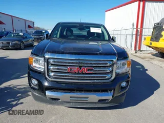 2015 GMC Canyon 4WD SLT z VIN 1GTG6CE33F1134747, wystawiony jako IAAI lot #41502300 z przebiegiem 143 027 mil mil oraz . Historia ofert i sprzedaży dostępna na DreamBid. Obrazek 13.