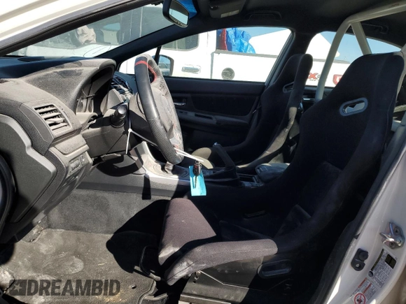 2016 Subaru WRX STI z VIN JF1VA2M64G9809798, wystawiony jako Copart lot #87480534 z przebiegiem 59 136 mil mil oraz Szkoda całkowita • Salvage title. Historia ofert i sprzedaży dostępna na DreamBid. Obrazek 7.