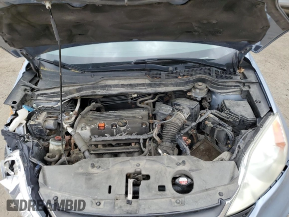 2011 Honda CR-V LX z VIN 5J6RE4H35BL014857, wystawiony jako Copart lot #54288135 z przebiegiem 205 231 mil mil oraz Szkoda całkowita • Salvage title. Historia ofert i sprzedaży dostępna na DreamBid. Obrazek 12.