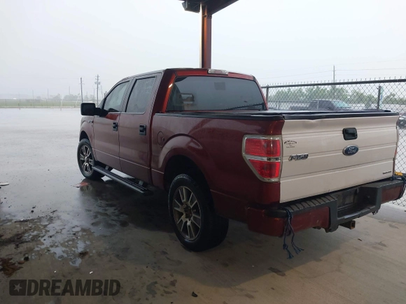2014 Ford F-150 XL with VIN 1FTFW1CF1EKD58198, listed as a IAAI auction lot 42086106 with 401,943 mi miles. Bid and sale history available at carsss.com. Image 3.