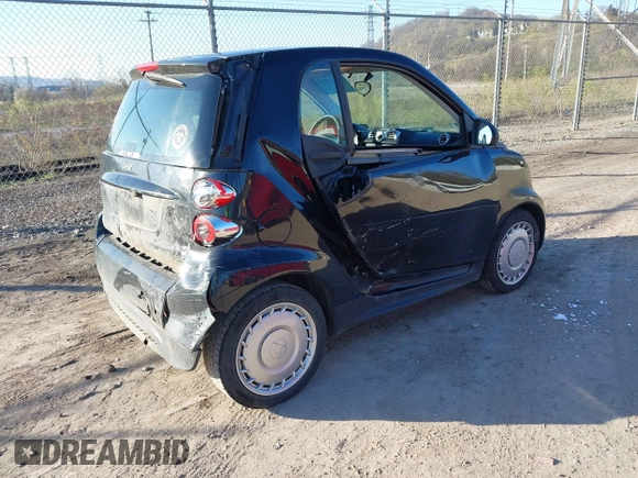 2015 Smart fortwo Passion with VIN WMEEJ3BA6FK804974, listed as a IAAI auction lot 42041904 with 97,514 mi miles and . Bid and sale history available at DreamBid. Image 4.