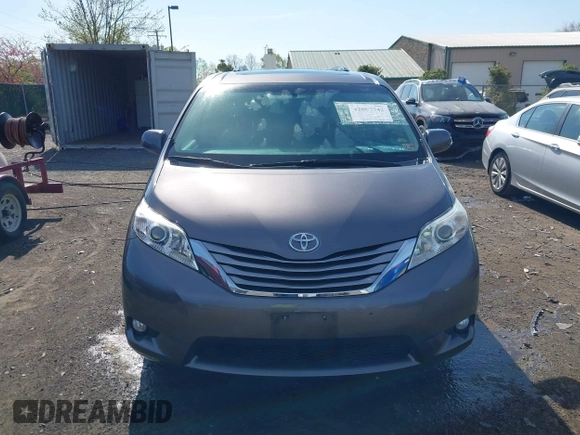 2015 Toyota Sienna XLE with VIN 5TDYK3DC9FS685768, listed as a IAAI auction lot 42062942 with 132,242 mi miles. Bid and sale history available at carsss.com. Image 12.