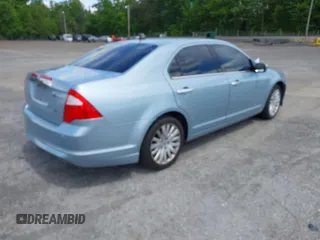 2010 Ford Fusion Hybrid with VIN 3FADP0L34AR400461, listed as a IAAI auction lot 42126130 with Not Provided miles and . Bid and sale history available at DreamBid. Image 4.