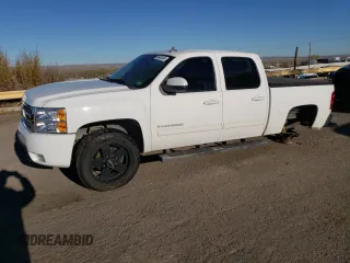 2012 Chevrolet Silverado 1500 LTZ with VIN 1GCPKTE77CF116345, listed as a Copart auction lot 49403454 with 174,057 mi miles and Salvage Title. Bid and sale history available at DreamBid. Image 1.