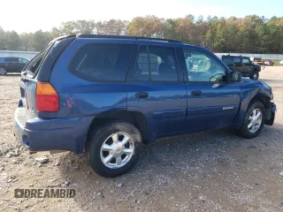 2005 GMC Envoy SLE with VIN 1GKDS13S352369384, listed as a Copart auction lot 79996394 with 117,697 mi miles and Salvage Title. Bid and sale history available at carsss.com. Image 3.