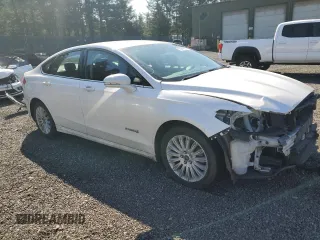 2016 Ford Fusion SE Hybrid with VIN 3FA6P0LUXGR188594, listed as a Copart auction lot 52944005 with 111,724 mi miles and Salvage Title. Bid and sale history available at carsss.com. Image 4.