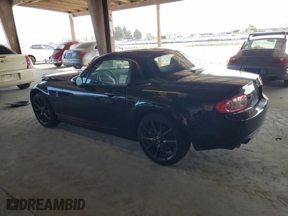 2014 Mazda MX-5 Miata Club with VIN JM1NC2MF0E0235061, listed as a Copart auction lot 62741565 with 63,767 mi miles and Salvage title. Bid and sale history available at DreamBid. Image 2.
