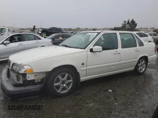 1999 Volvo S70 with VIN YV1LS55A2X2611694, listed as a Copart auction lot 43749155 with 185,184 mi miles and Salvage Title. Bid and sale history available at DreamBid. Image 1.