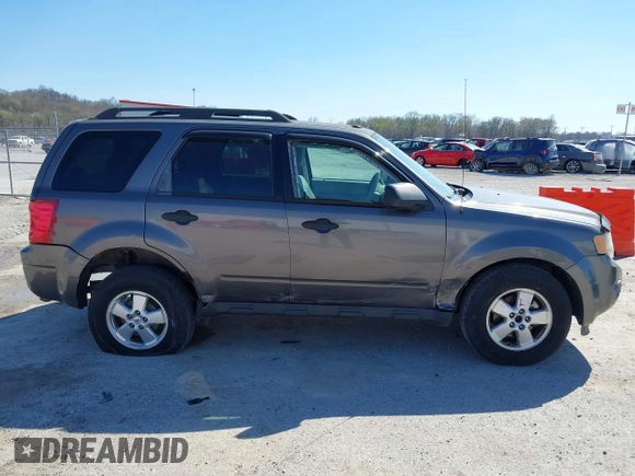 2011 Ford Escape XLT with VIN 1FMCU0D74BKA81385, listed as a IAAI auction lot 41895835 with 238,298 mi miles. Bid and sale history available at carsss.com. Image 13.