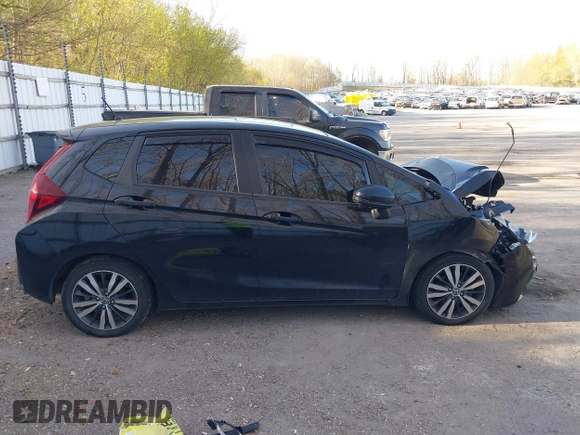 2015 Honda Fit EX with VIN 3HGGK5G82FM744840, listed as a IAAI auction lot 42138045 with 91,321 mi miles and . Bid and sale history available at DreamBid. Image 13.