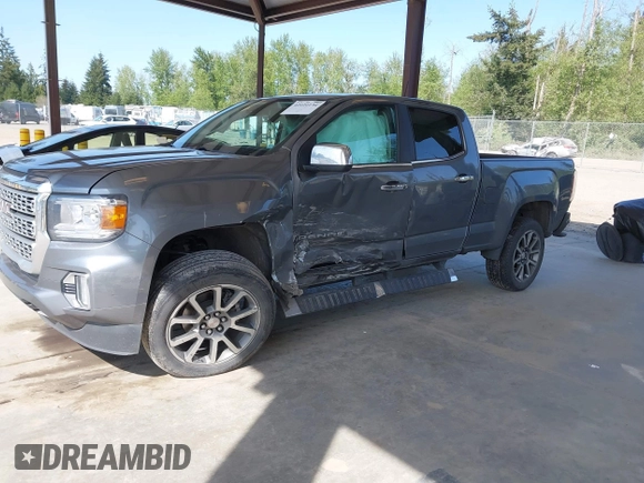 2021 GMC Canyon 4WD Denali with VIN 1GTG6EEN5M1102747, listed as a IAAI auction lot 42121134 with 60,412 mi miles and . Bid and sale history available at DreamBid. Image 17.
