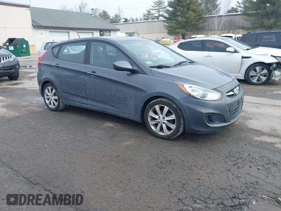 2012 Hyundai Accent SE with VIN KMHCU5AE4CU037411, listed as a IAAI auction lot 41659662 with 163,021 mi miles. Bid and sale history available at carsss.com. Image 1.
