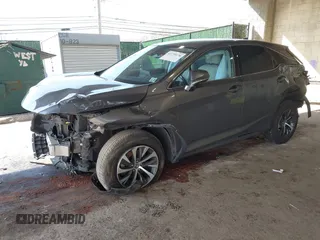 2020 Lexus RX 350 with VIN 2T2AZMDA2LC222307, listed as a IAAI auction lot 41739170 with 79,184 mi miles and . Bid and sale history available at DreamBid. Image 2.