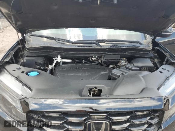 2023 Honda Passport Elite with VIN 5FNYF8H01PB030270, listed as a Copart auction lot 61402965 with 7,931 mi miles and Salvage title. Bid and sale history available at DreamBid. Image 12.