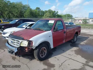 1999 Ford F-150 Work Series with VIN 1FTZF1727XKA70063, listed as a IAAI auction lot 41948032 with 134,642 mi miles. Bid and sale history available at carsss.com. Image 2.