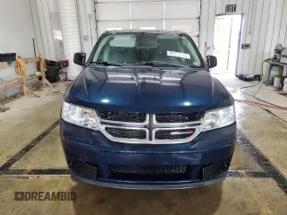 2013 Dodge Journey American Value with VIN 3C4PDCAB4DT581984, listed as a Copart auction lot 59953515 with 166,927 mi miles and Salvage title. Bid and sale history available at DreamBid. Image 5.