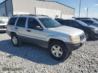 2003 Jeep Grand Cherokee Laredo with VIN 1J4GW48S23C513287, listed as a Copart auction lot 50515055 with 251,806 mi miles and Salvage Title. Bid and sale history available at carsss.com. Image 4.
