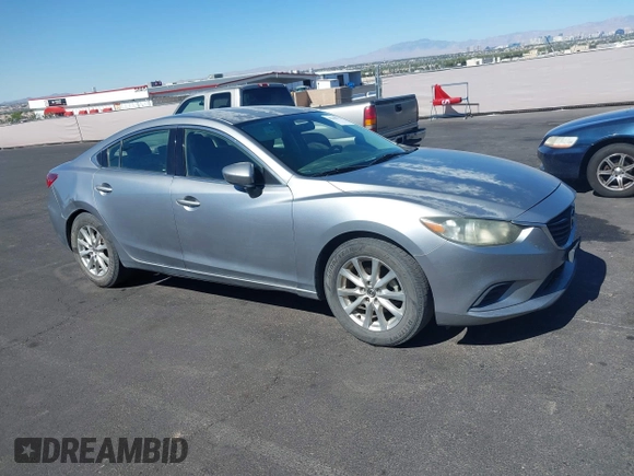 2014 Mazda 6 i Sport with VIN JM1GJ1U61E1151348, listed as a IAAI auction lot 42248173 with 275,764 mi miles and . Bid and sale history available at DreamBid. Image 1.