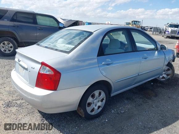 2004 Kia Spectra LX with VIN KNAFE122645052206, listed as a IAAI auction lot 41767864 with 63,866 mi miles. Bid and sale history available at carsss.com. Image 4.