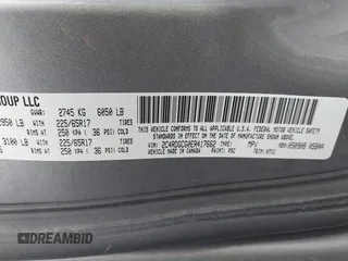 2014 Dodge Grand Caravan SXT with VIN 2C4RDGCG0ER417662, listed as a IAAI auction lot 41933279 with 156,751 mi miles and . Bid and sale history available at DreamBid. Image 9.