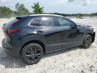 2024 Mazda CX-30 Premium Plus with VIN 3MVDMBEY9RM617907, listed as a Copart auction lot 56507565 with 8,237 mi miles and Salvage title. Bid and sale history available at DreamBid. Image 3.