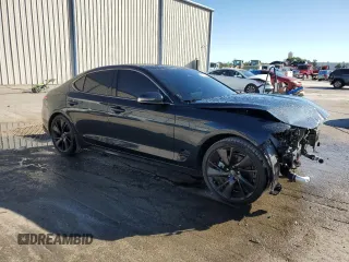 2023 Genesis G70 2.0T with VIN KMTG34TA5PU129955, listed as a Copart auction lot 82980774 with 12,625 mi miles and Salvage Title. Bid and sale history available at DreamBid. Image 4.