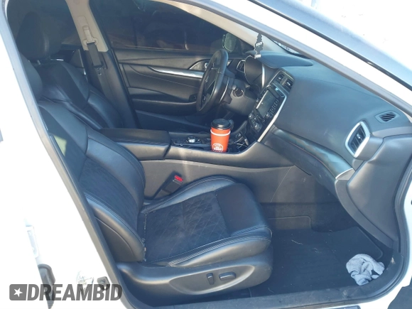 2018 Nissan Maxima SV with VIN 1N4AA6AP7JC372246, listed as a IAAI auction lot 41387139 with 104,686 mi miles and . Bid and sale history available at DreamBid. Image 5.