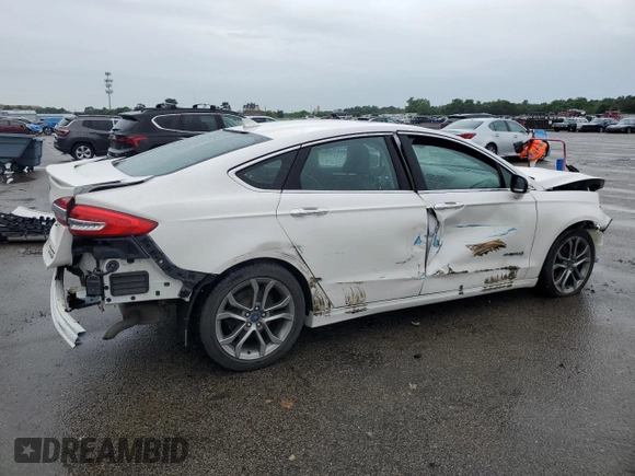2019 Ford Fusion Titanium с VIN 3FA6P0RU6KR212454, выставлен на аукционе Copart как лот 63137755 с пробегом 30 024 миль миль и Списание • Salvage title. История ставок и продаж доступна на DreamBid. Изображение 3.