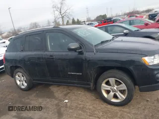 2012 Jeep Compass Sport with VIN 1C4NJCBA6CD660843, listed as a IAAI auction lot 41679095 with 173,950 mi miles. Bid and sale history available at carsss.com. Image 13.