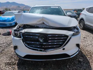 2023 Mazda CX-9 Signature with VIN JM3TCBEY7P0640089, listed as a Copart auction lot 61674085 with 55,387 mi miles and Salvage title. Bid and sale history available at DreamBid. Image 5.