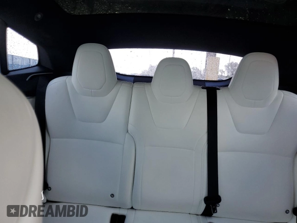 2017 Tesla Model S 100D z VIN 5YJSA1E21HF229936, wystawiony jako Copart lot #54734955 z przebiegiem 125 511 mil mil oraz Szkoda całkowita • Salvage title. Historia ofert i sprzedaży dostępna na DreamBid. Obrazek 10.