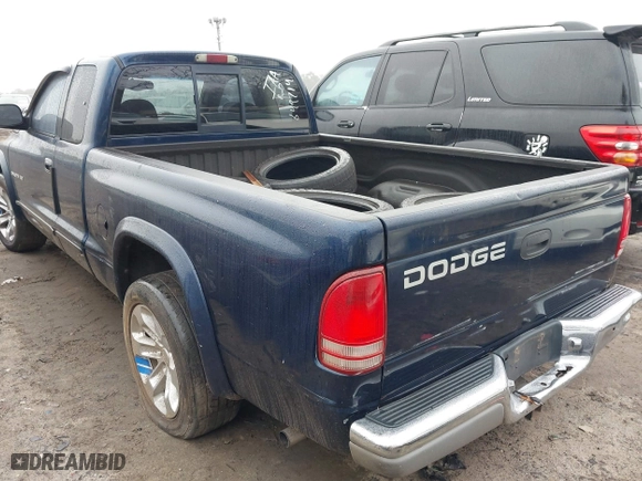 2002 Dodge Dakota SLT with VIN 1B7GL42X72S649714, listed as a IAAI auction lot 41426396 with 227,056 mi miles. Bid and sale history available at carsss.com. Image 3.