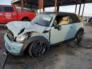 2012 MINI Convertible with VIN WMWZN3C59CT135351, listed as a Copart auction lot 86711044 with 93,515 mi miles and Non Repairable. Bid and sale history available at DreamBid. Image 1.