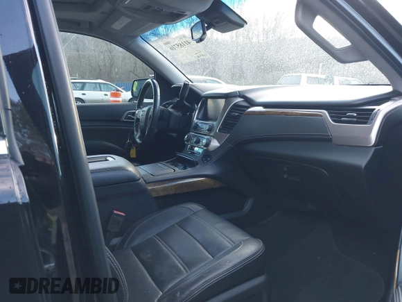 2016 GMC Yukon Denali with VIN 1GKS2CKJ2GR412201, listed as a IAAI auction lot 41185716 with 124,421 mi miles. Bid and sale history available at carsss.com. Image 5.