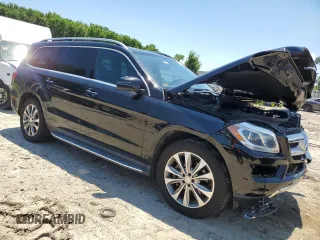 2015 Mercedes-Benz GL-Class GL 450 with VIN 4JGDF6EE1FA562088, listed as a Copart auction lot 58736934 with 104,550 mi miles and Salvage Title. Bid and sale history available at carsss.com. Image 4.