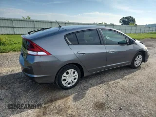 2012 Honda Insight LX with VIN JHMZE2H52CS005731, listed as a Copart auction lot 64077625 with 157,026 mi miles and Non repairable. Bid and sale history available at DreamBid. Image 3.