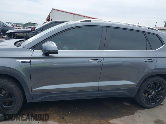 2022 Volkswagen Taos SE z VIN 3VVSX7B2XNM062037, wystawiony jako IAAI lot #42051064 z przebiegiem 30 149 mil mil oraz . Historia ofert i sprzedaży dostępna na DreamBid. Obrazek 15.