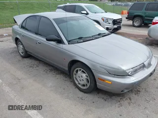 1997 Saturn SL with VIN 1G8ZK527XVZ257477, listed as a IAAI auction lot 42029648 with 114,371 mi miles and . Bid and sale history available at DreamBid. Image 1.