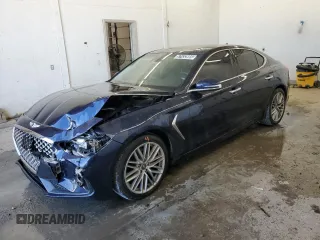 2021 Genesis G70 2.0T with VIN KMTG34LA0MU072088, listed as a Copart auction lot 57433985 with 77,876 mi miles and Clean title. Bid and sale history available at DreamBid. Image 1.