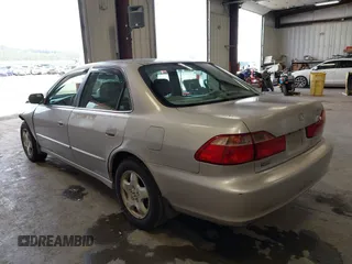 1998 Honda Accord EX z VIN 1HGCG1651WA805964, wystawiony jako IAAI lot #42320827 z przebiegiem 239 279 mil mil oraz . Historia ofert i sprzedaży dostępna na DreamBid. Obrazek 3.