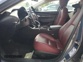 2022 Mazda 3 Carbon Edition с VIN 3MZBPACL3NM318079, выставлен на аукционе Copart как лот 58185015 с пробегом 36 299 миль миль и Списание • Salvage title. История ставок и продаж доступна на DreamBid. Изображение 7.