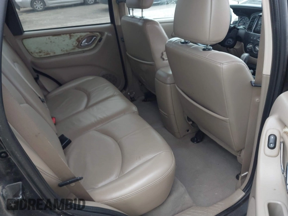 2005 Mazda Tribute S with VIN 4F2YZ96145KM32776, listed as a IAAI auction lot 42159162 with 200,416 mi miles and . Bid and sale history available at DreamBid. Image 8.